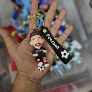 90's Kids Football Star Lionel Messi Keychain | Soccer Player Figure | Blue Soft Strap with Football Print | Premium Gold Keyring | Sports Fan Collectible